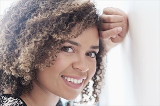 Mixed race woman smiling