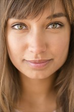 Close up of mixed race woman smiling