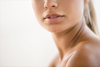 Close up of bare shoulder of mixed race woman