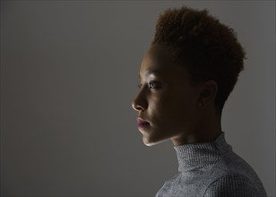 Profile of mixed race woman