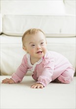 Caucasian baby girl with Down Syndrome