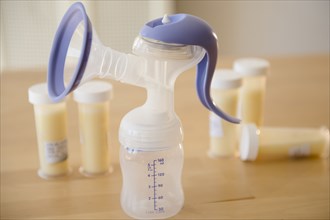 Breast pump and vials of breast milk