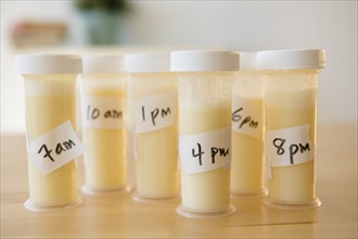 Vials of breast milk with time