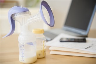Breast pump and breast milk in bottle
