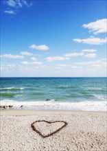 Heart-shape on ocean beach