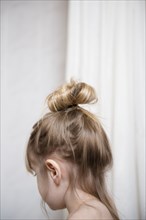 Caucasian girl with hair up