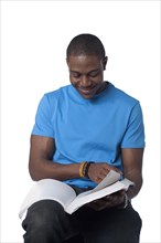 Black man reading book