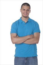 Smiling Hispanic man with arms crossed
