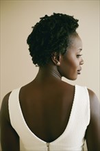 Black woman looking over her shoulder