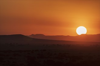 Sunset over desert landscape