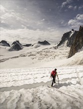Rear view of climber on glacier