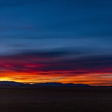 Sunset sky over foothills