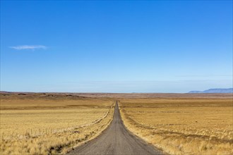 Empty desert road and blue sky