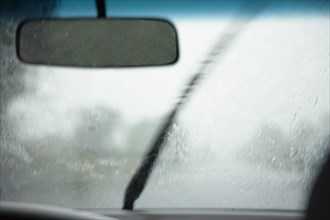 Car windshield in rain