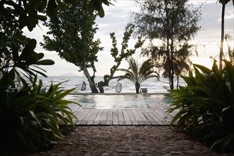 Hotel swimming pool overlooking ocean