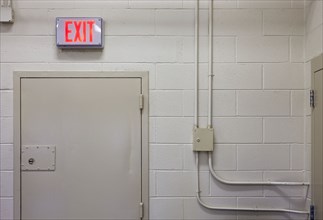 Exit sign in industrial interior