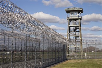 Tower and chainlink fence in prison