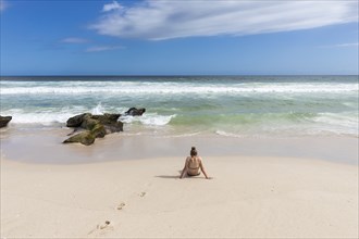 Girl relaxing on beach