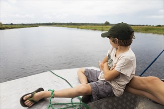 Boy in boat on Zambezi River