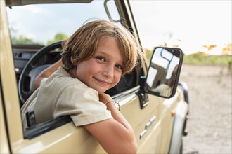 Boy in safari vehicle