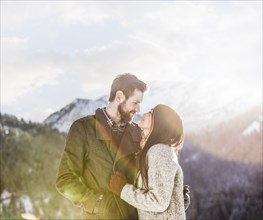Smiling couple in Winter landscape
