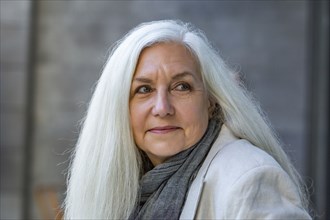 Senior woman with long white hair
