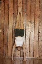 Woman doing headstand