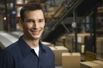 Portrait of man in warehouse