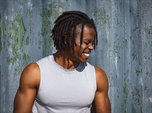 Portrait of smiling athlete man outdoors