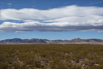 Clouds over desert landscape in Gila National Forest