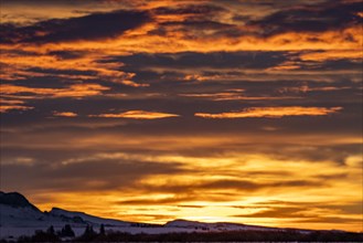 USA, Idaho, Bellevue, Dramatic sunrise sky above snow covered landscape