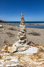 Stone carin on beach