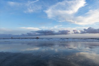 USA, California, Oceanside, Clouds reflecting in sea