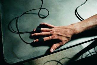 Hand connected to polygraph test