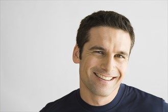 Portrait of smiling mid adult man