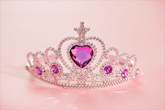 Studio shot of tiara with artificial pink gemstones