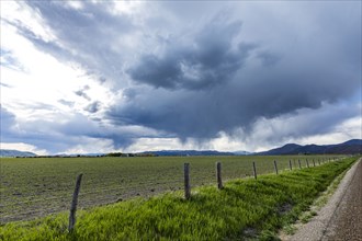Stormy sky over agricultural fields