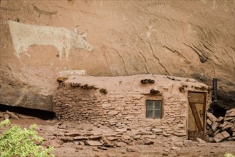 Petroglyph and ancient adobe dwelling