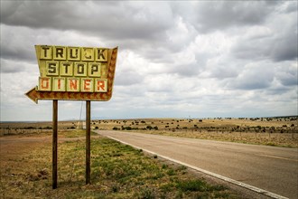 Truck stop sign on desert