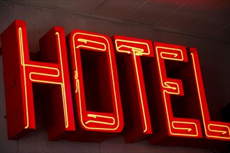 Red hotel neon