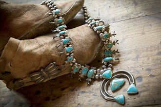 Old moccasins and turquoise necklace