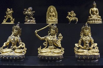 Antique Chinese brass statues