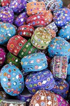 Variety of jeweled boxes at market