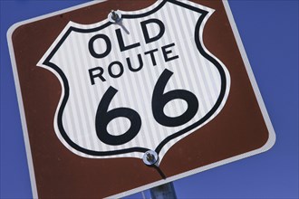 Close-up of vintage route 66 sign
