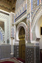 Traditionally decorated walls and tilework in mosque
