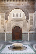 Fountain in madrasa school built in 14th century