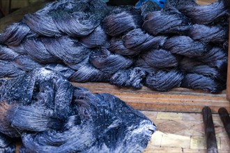 Skeins of agave silk freshly dyed in indigo