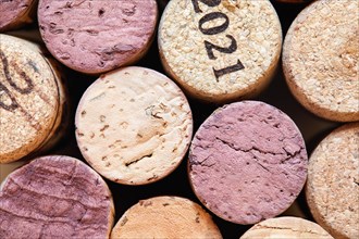 Full frame of textured and wine stained corks
