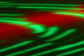 Green and red light streaks background