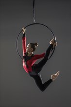 Teenage girl (14-15) performing aerial dance